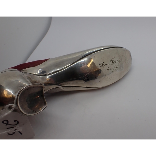 215 - A silver Shoe Pin Cushion engraved M,