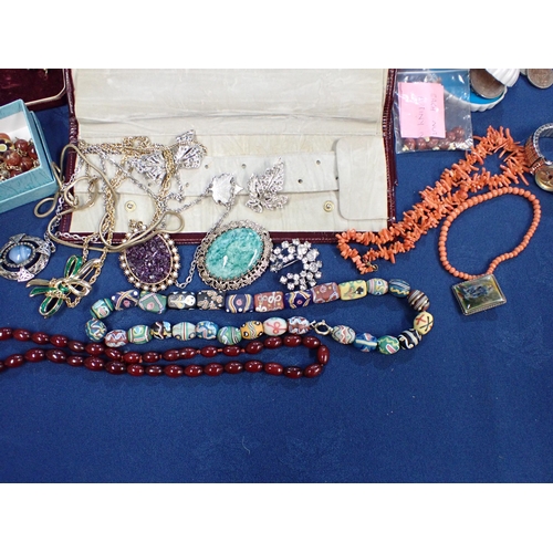 220 - A box of Costume Jewellery including; coral Necklaces, amber type Bead Necklace, Brooches, Beads, Pe... 