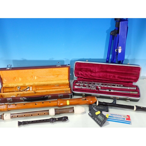 299 - A box of Flutes and other instruments