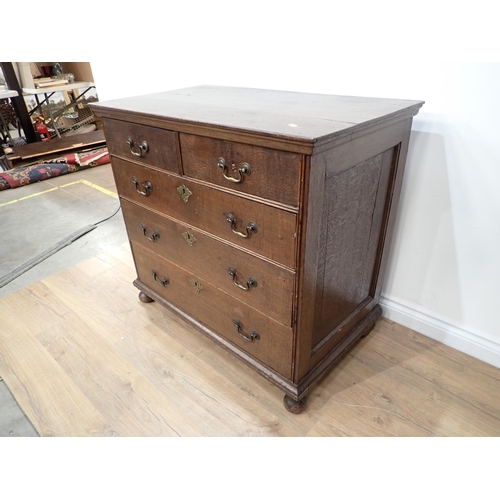 30A - An early 18th Century oak Chest of two short and three long drawers beneath moulded top mounted upon... 