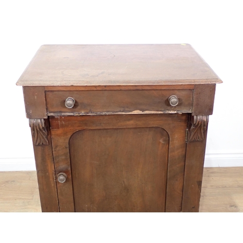 311 - A Victorian mahogany Washstand with hinged lid above cupboard door on plinth base 2ft 9in H x 2ft 4i... 