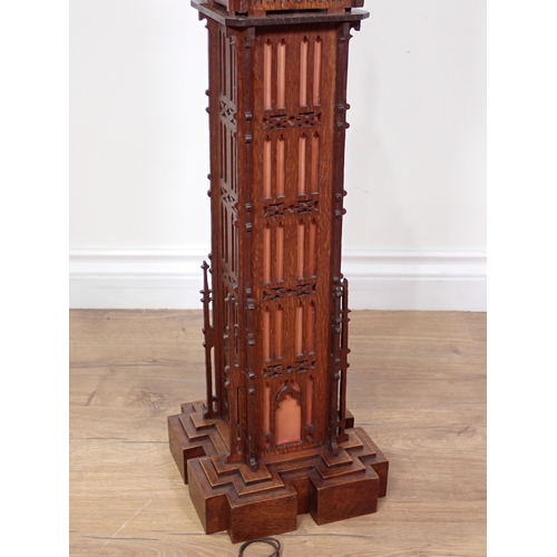 334 - An oak architectural Clock in the form of Big Ben with pierced Gothic decoration on plinth base 3ft ... 