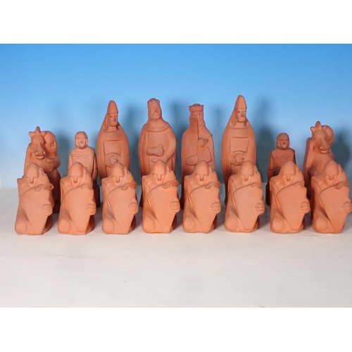 335 - A pottery Chess Set by Margaret Holder