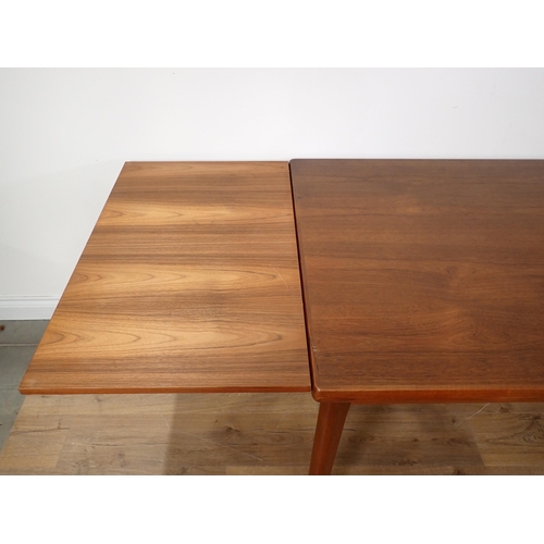 349 - A Danish Teak extending Dining Table by Morgens Kold and four Chairs by String, the table with pull-... 