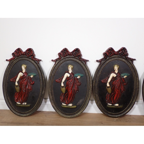 361 - A set of six cast iron oval plaques depicting classical females with ribbon surmounts, 1ft 8in H