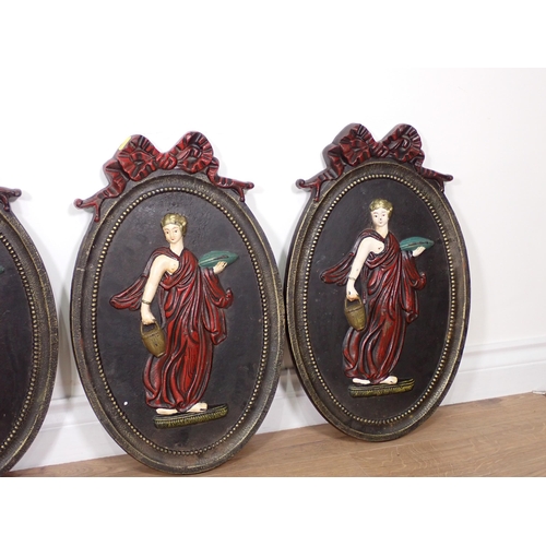 361 - A set of six cast iron oval plaques depicting classical females with ribbon surmounts, 1ft 8in H