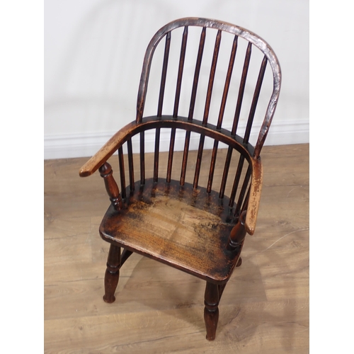 365 - An antique ash stick back child's Elbow Chair 2ft 6in H x 1ft 6in W