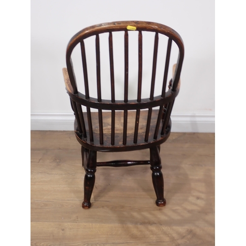 365 - An antique ash stick back child's Elbow Chair 2ft 6in H x 1ft 6in W