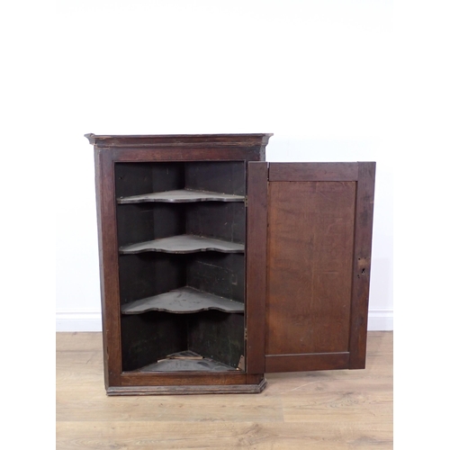 374 - A Georgian oak hanging Corner Cupboard 3ft H x 2ft 1in W