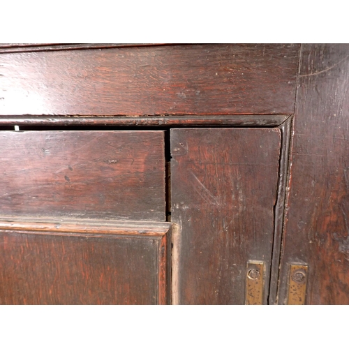 374 - A Georgian oak hanging Corner Cupboard 3ft H x 2ft 1in W