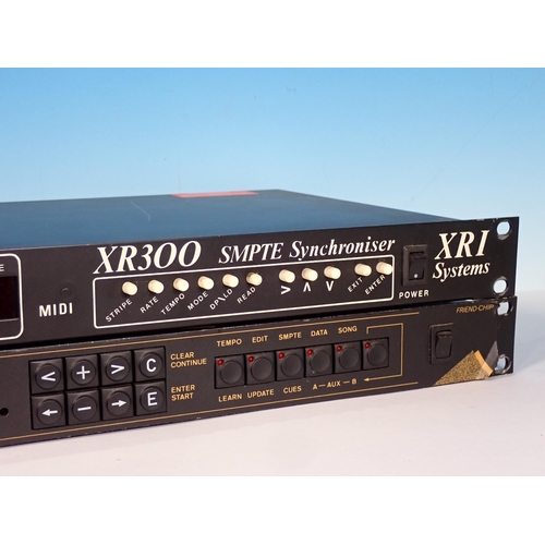 387 - An XRI Systems XR300 smpte Synchroniser with manuals and an SRC/cat smpte to midi Synchroniser (pass... 