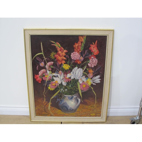 438 - ENGLISH SCHOOL, mid 20th Century, mixed flowers in a Vase, indistinctly signed, oil on board, 30 x 2... 