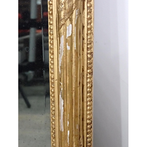 455 - A 19th Century gilt framed Wall Mirror with bevelled plate flanked by fluted Corinthian Columns 2ft ... 