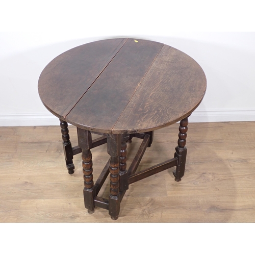 459 - A 17th Century and later oak Gateleg Table on bobbin turned supports 2ft 9in W x 2ft 4in H