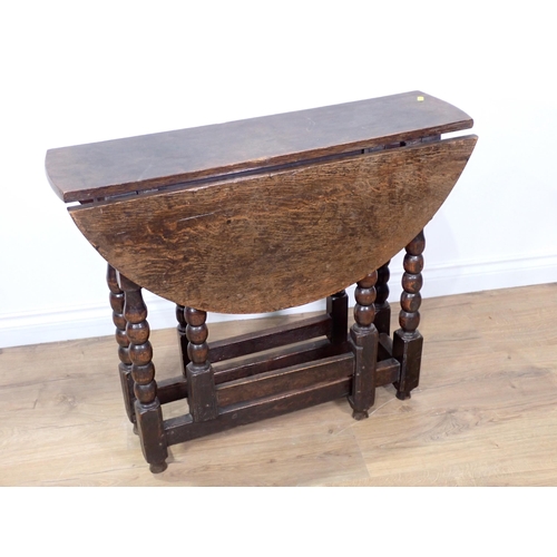 459 - A 17th Century and later oak Gateleg Table on bobbin turned supports 2ft 9in W x 2ft 4in H