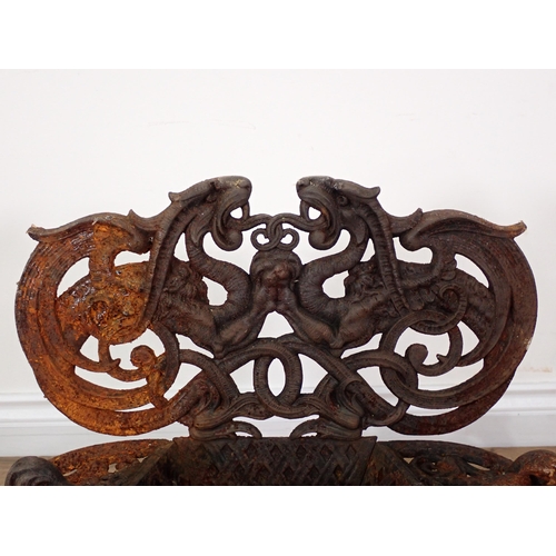 461 - An antique cast iron Fire Basket with dragon and interlocking scroll design 1ft 10in H x 1ft 9in W