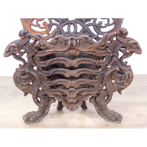 461 - An antique cast iron Fire Basket with dragon and interlocking scroll design 1ft 10in H x 1ft 9in W