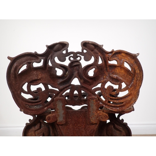 461 - An antique cast iron Fire Basket with dragon and interlocking scroll design 1ft 10in H x 1ft 9in W