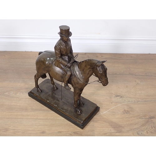 464 - A bronze effect Sculpture of a mounted Huntsman 1ft 3in H