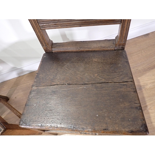 470 - An 18th Century fruitwood pierced splat back Chair with oak seat and a 19th Century oak Chair