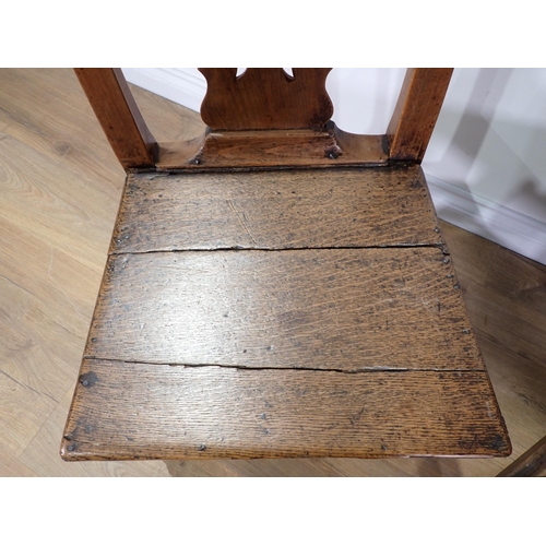 470 - An 18th Century fruitwood pierced splat back Chair with oak seat and a 19th Century oak Chair