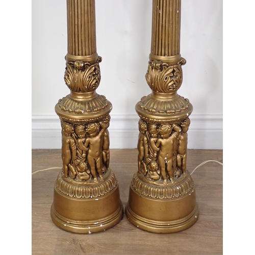 480 - A pair of large gilt Table Lamps with moulded frieze of cherubs beneath fluted columns 3ft 1in H (fa... 