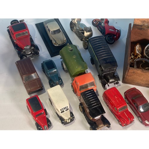 445 - A box of Diecast Models and modern Wristwatches