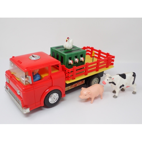 177 - A boxed battery operated Marx Farm Truck