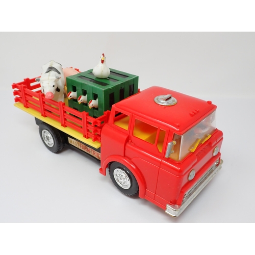 177 - A boxed battery operated Marx Farm Truck