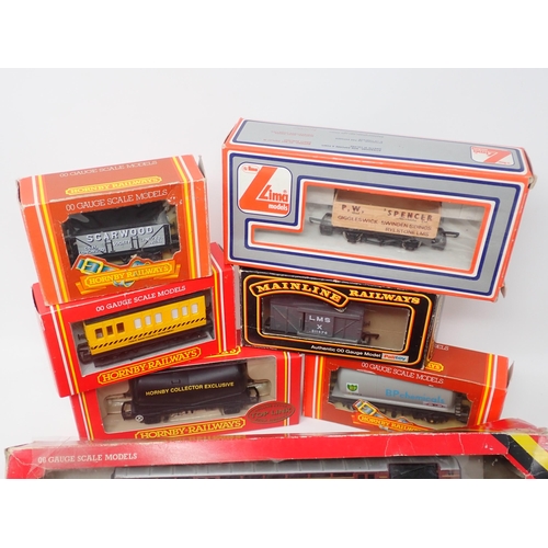 212 - A boxed Hornby 00 gauge Royal Mail TPO Coach, Southern DMU Coach, Airfix LMS Coach, five unboxed LMS... 