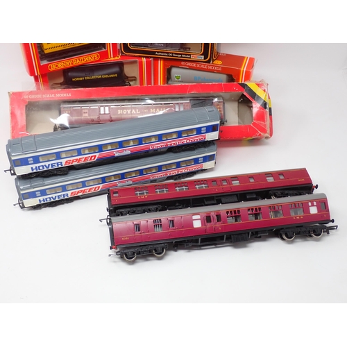 212 - A boxed Hornby 00 gauge Royal Mail TPO Coach, Southern DMU Coach, Airfix LMS Coach, five unboxed LMS... 