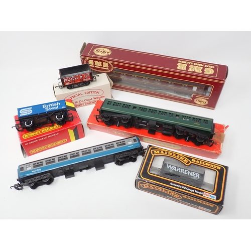 212 - A boxed Hornby 00 gauge Royal Mail TPO Coach, Southern DMU Coach, Airfix LMS Coach, five unboxed LMS... 