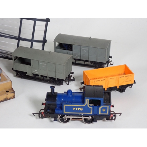 215 - A quantity of 00 gauge Railway including Tri-ang 0-6-0T, six assorted 0-4-0 Shunters, boxed Hornby-D... 