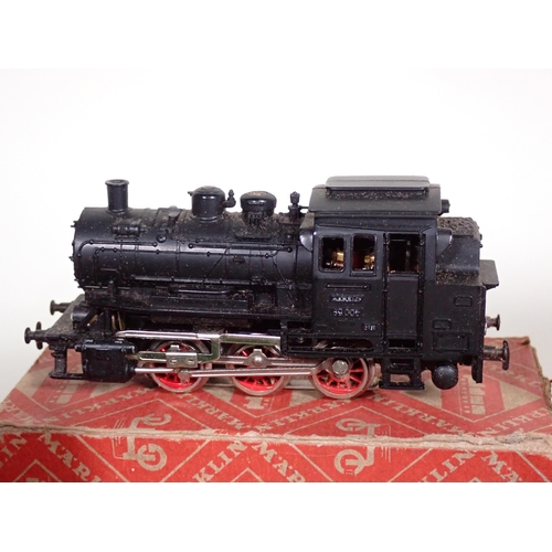 216 - A part boxed Marklin HO gauge 3-rail 2-6-0 Locomotive and Tender, a boxed 3-rail 0-6-0 Tank Locomoti... 