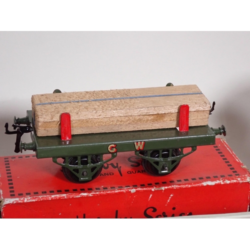 239 - A boxed Hornby 0 gauge Wine Wagon, a boxed No.1 Timber Wagon, an LMS Refrigerator Van in reproductio... 