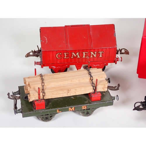 244 - An unboxed Hornby 0 gauge No.2 Lumber Wagon, No.1 L.M.S. Luggage Van in reproduction box, and ten un... 