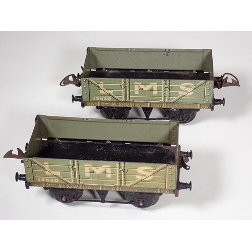 244 - An unboxed Hornby 0 gauge No.2 Lumber Wagon, No.1 L.M.S. Luggage Van in reproduction box, and ten un... 