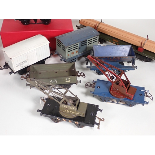 244 - An unboxed Hornby 0 gauge No.2 Lumber Wagon, No.1 L.M.S. Luggage Van in reproduction box, and ten un... 