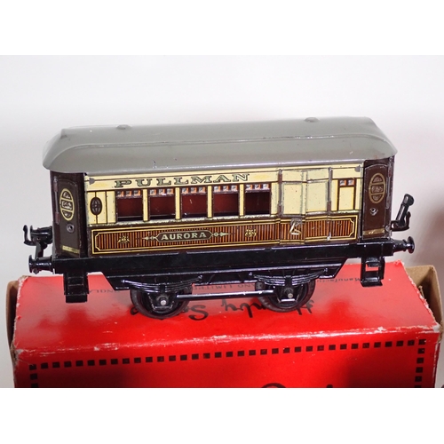 245 - A boxed Hornby 0 gauge M1/2 Pullman Coach, boxed No.1 Rotary Tipping Wagon, boxed Hopper Wagon, boxe... 