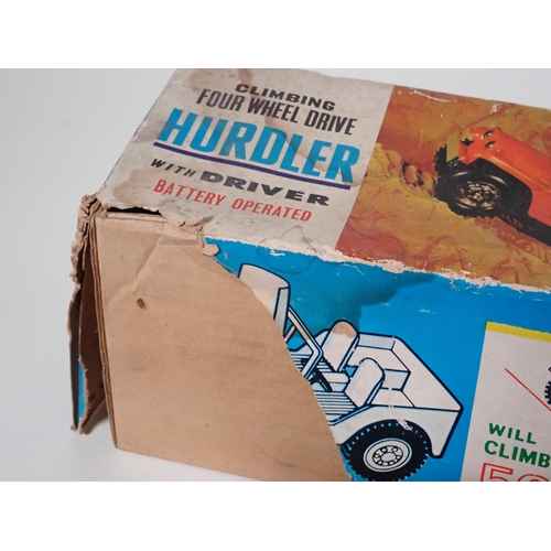 255 - A boxed battery operated OK Toy Rover 2000, a boxed battery operated 21Toy Hurdler four wheel drive,... 