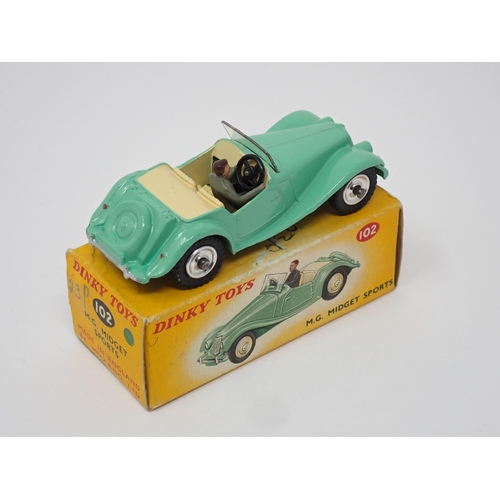 266 - A rare boxed Dinky Toys No.102 green MG Midget with spun hubs