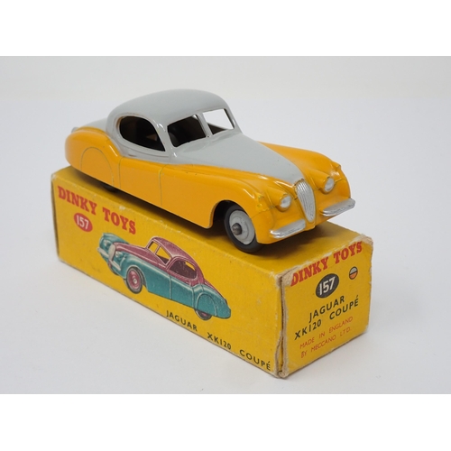 269 - A boxed Dinky Toys No. 157 yellow and grey Jaguar XK120