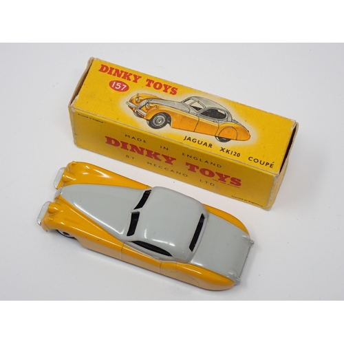 269 - A boxed Dinky Toys No. 157 yellow and grey Jaguar XK120