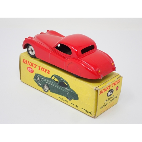 270 - A rare Dinky Toys No.157 red Jaguar XK120 with spun hubs