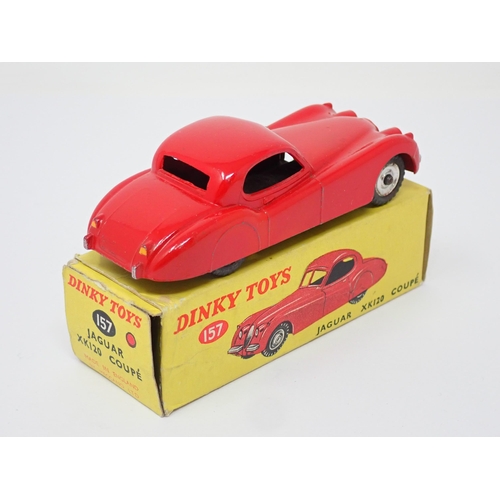 270 - A rare Dinky Toys No.157 red Jaguar XK120 with spun hubs