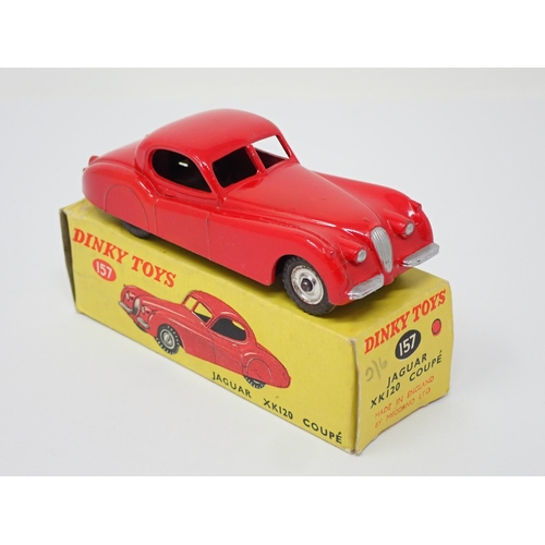 270 - A rare Dinky Toys No.157 red Jaguar XK120 with spun hubs