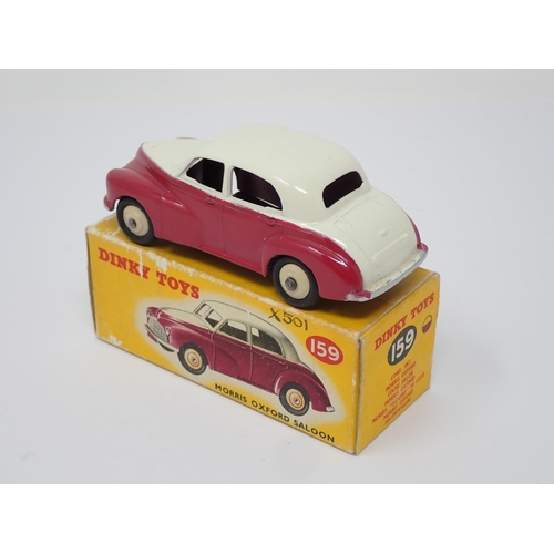 271 - A boxed Dinky Toys No.159 maroon and cream Morris Oxford