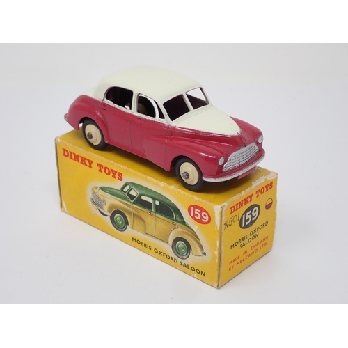 271 - A boxed Dinky Toys No.159 maroon and cream Morris Oxford