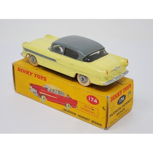 275 - A boxed Dinky Toys No.174 yellow and grey Hudson Hornet