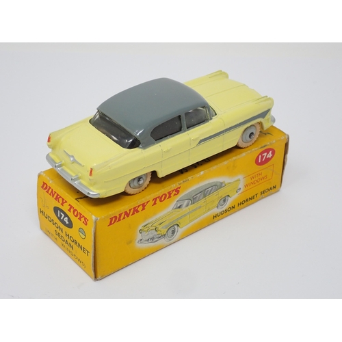 275 - A boxed Dinky Toys No.174 yellow and grey Hudson Hornet